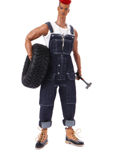 Mechanic doll holding tire and hammer